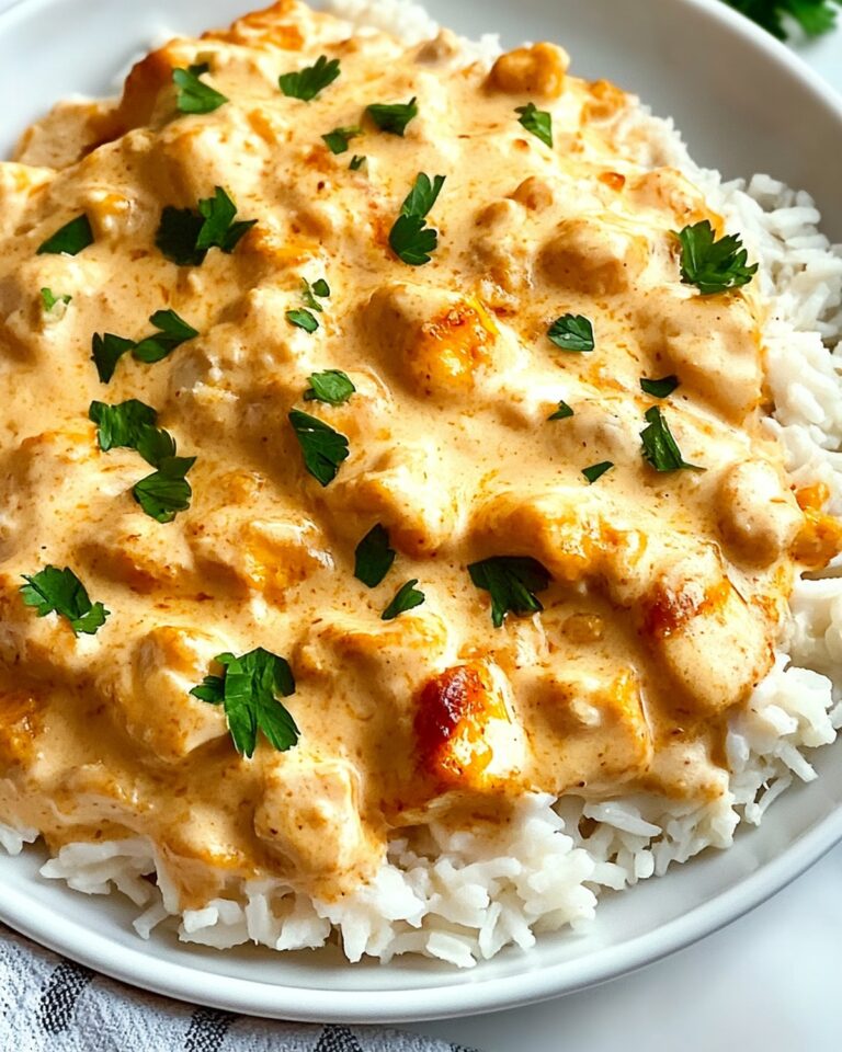 Cream-rich Smothered Chicken and Rice Recipe